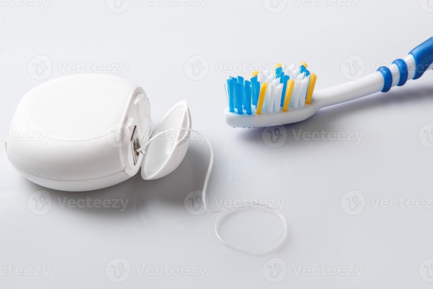 Toothbrush and dental floss photo