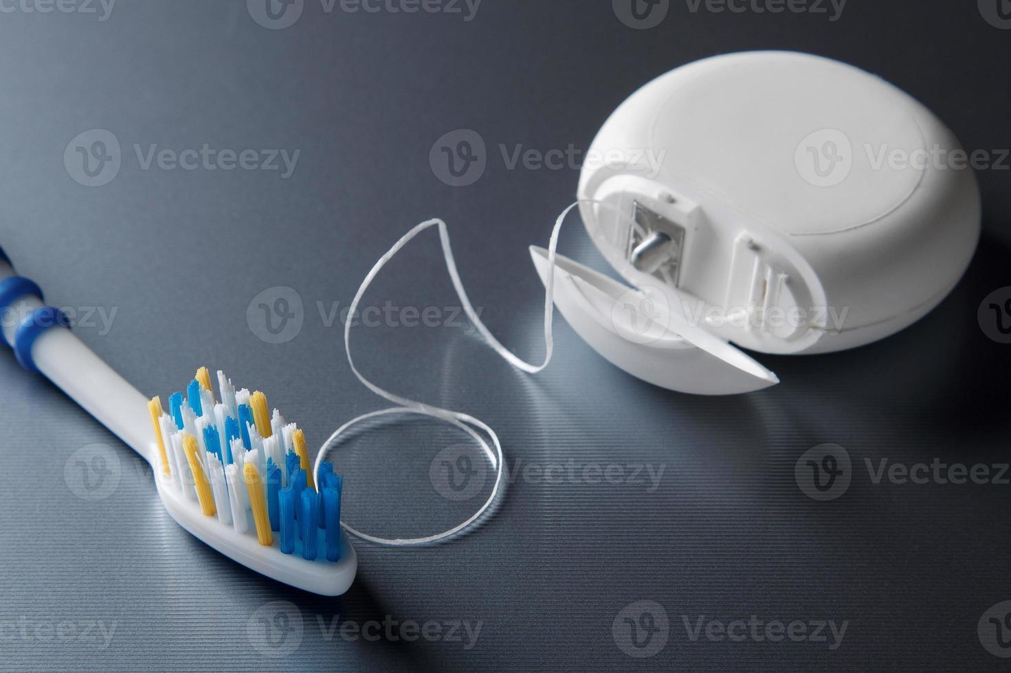 Toothbrush and dental floss photo