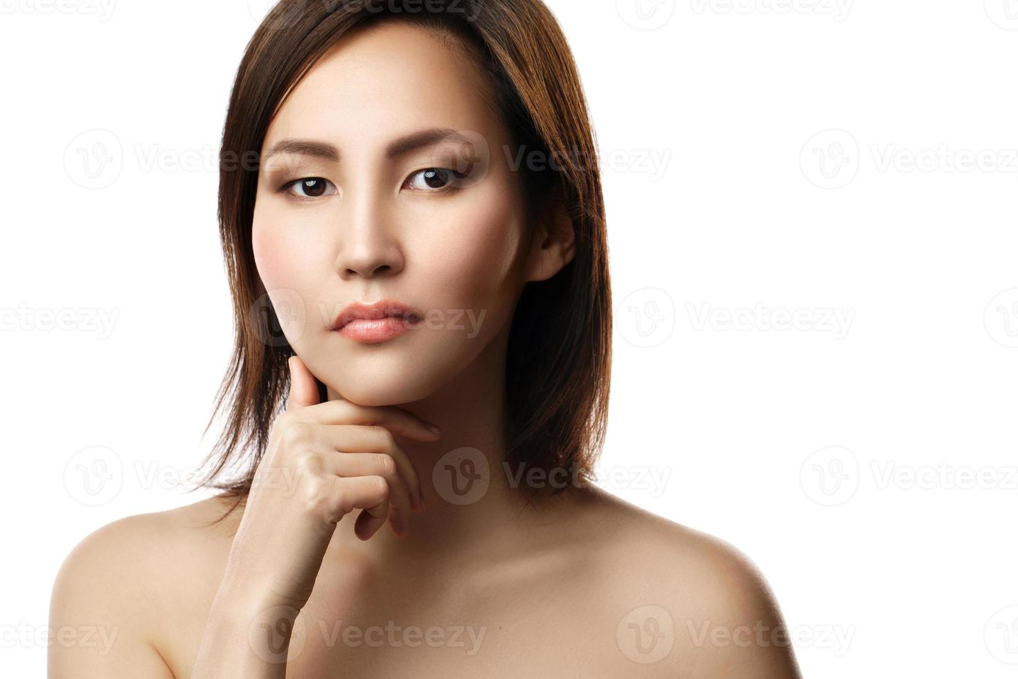 Portrait of young and beautiful asian woman on white background photo