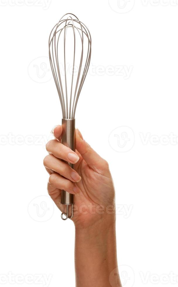 Woman Holding Egg Beater in the Air Isolated on White photo