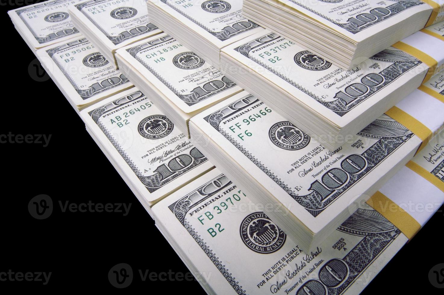 Stacks of One Hundred Dollar Bills photo