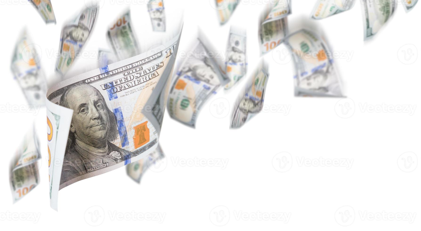 Several 100 Dollar Bills Falling From Above On White Background photo