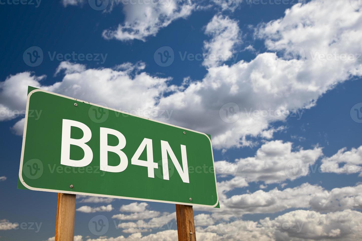 BB4N Green Road Sign Over Sky photo