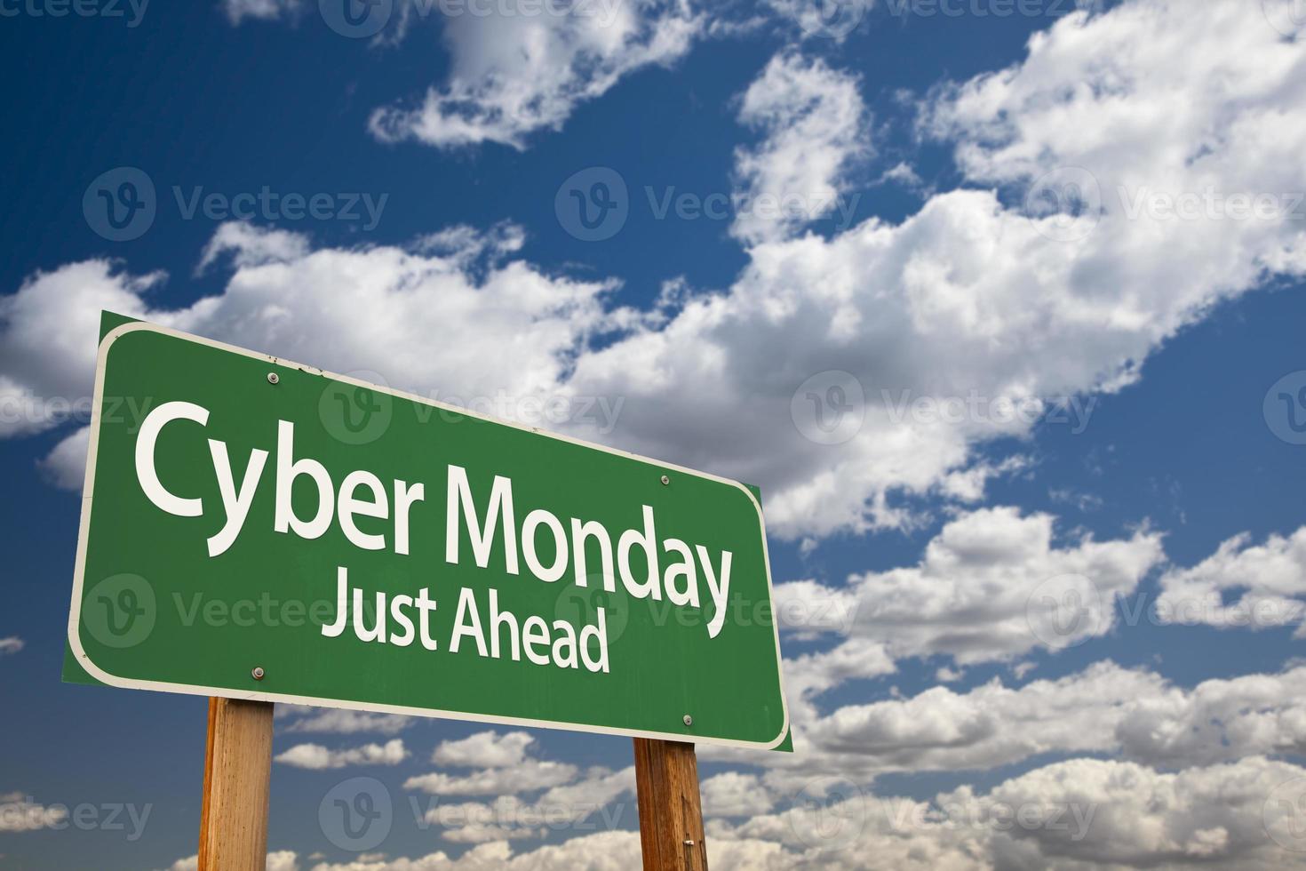Cyber Monday Just Ahead Green Road Sign and Clouds photo