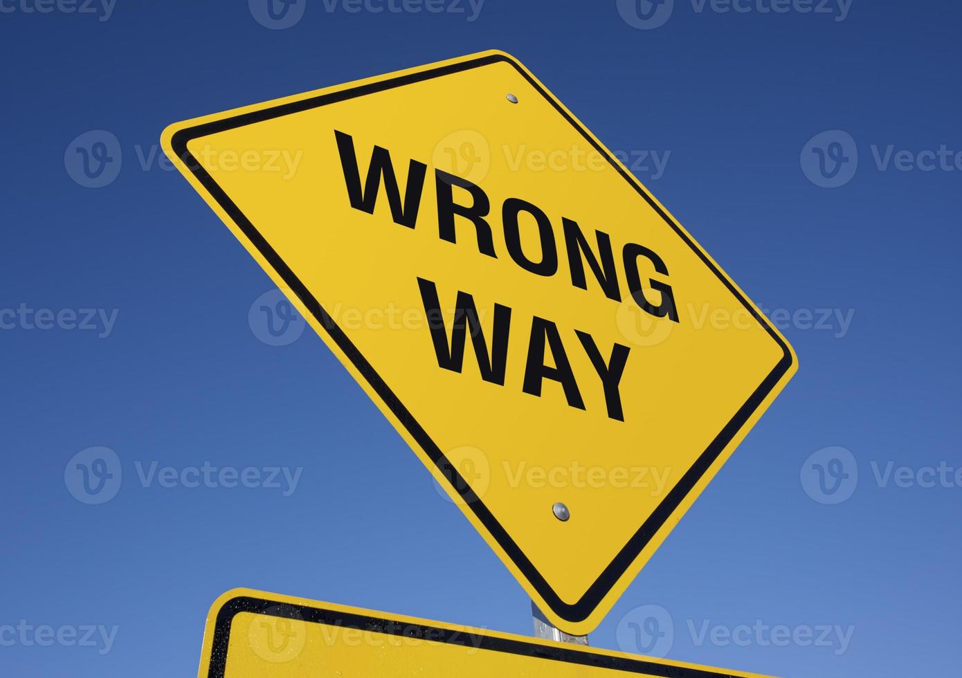 Yellow Wrong Way Road Sign photo