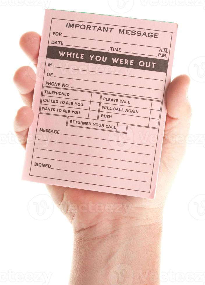 Male Hand Holding Blank Pink Message Pad photo