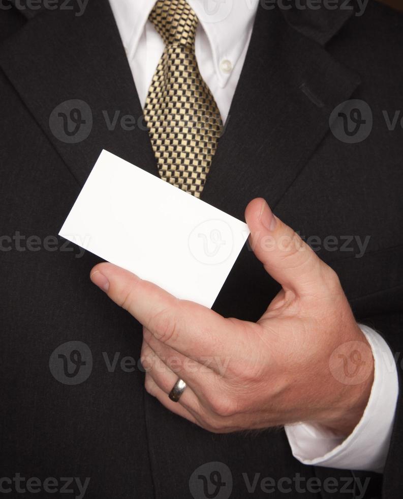 Businessman Holding Blank Business Card photo