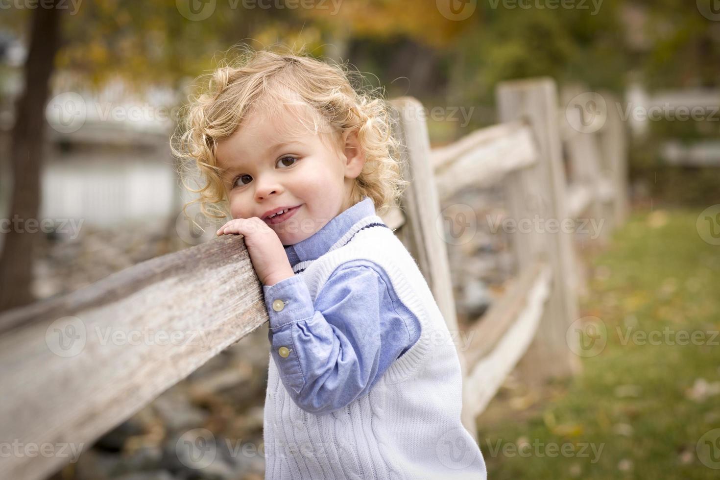 Adorable Young Boy Playing Outside photo