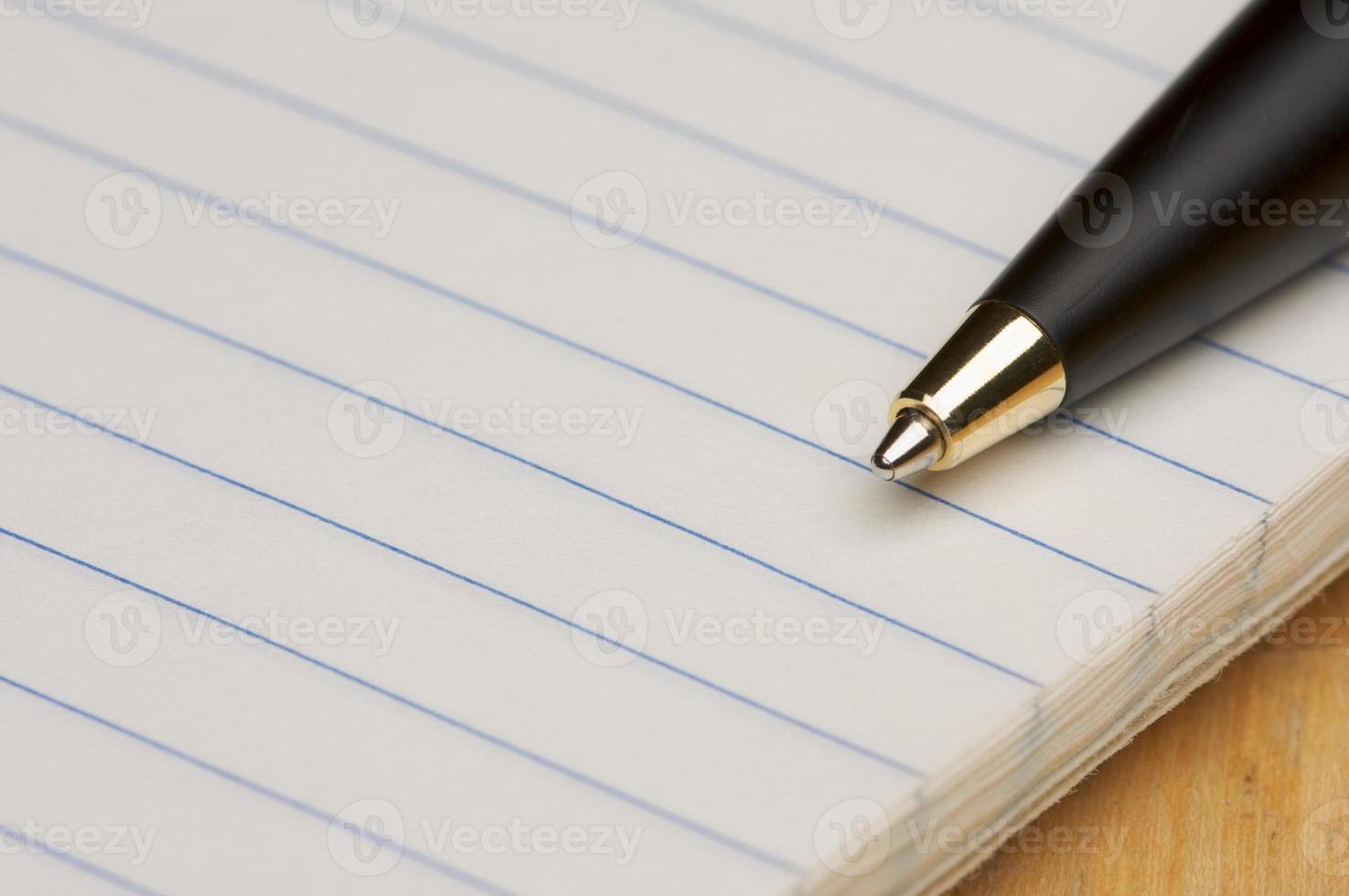 Pen and Pad of Paper 16304869 Stock Photo at Vecteezy