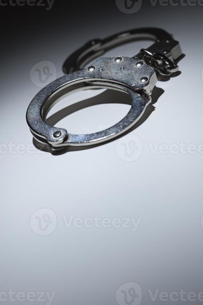 Abstract Pair of Handcuffs Under Spot Light - Text Room photo