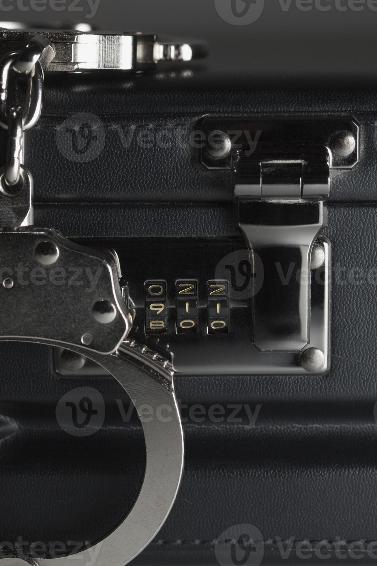 Pair of Handcuffs on Briefcase with 911 on Lock 16306078 Stock Photo at