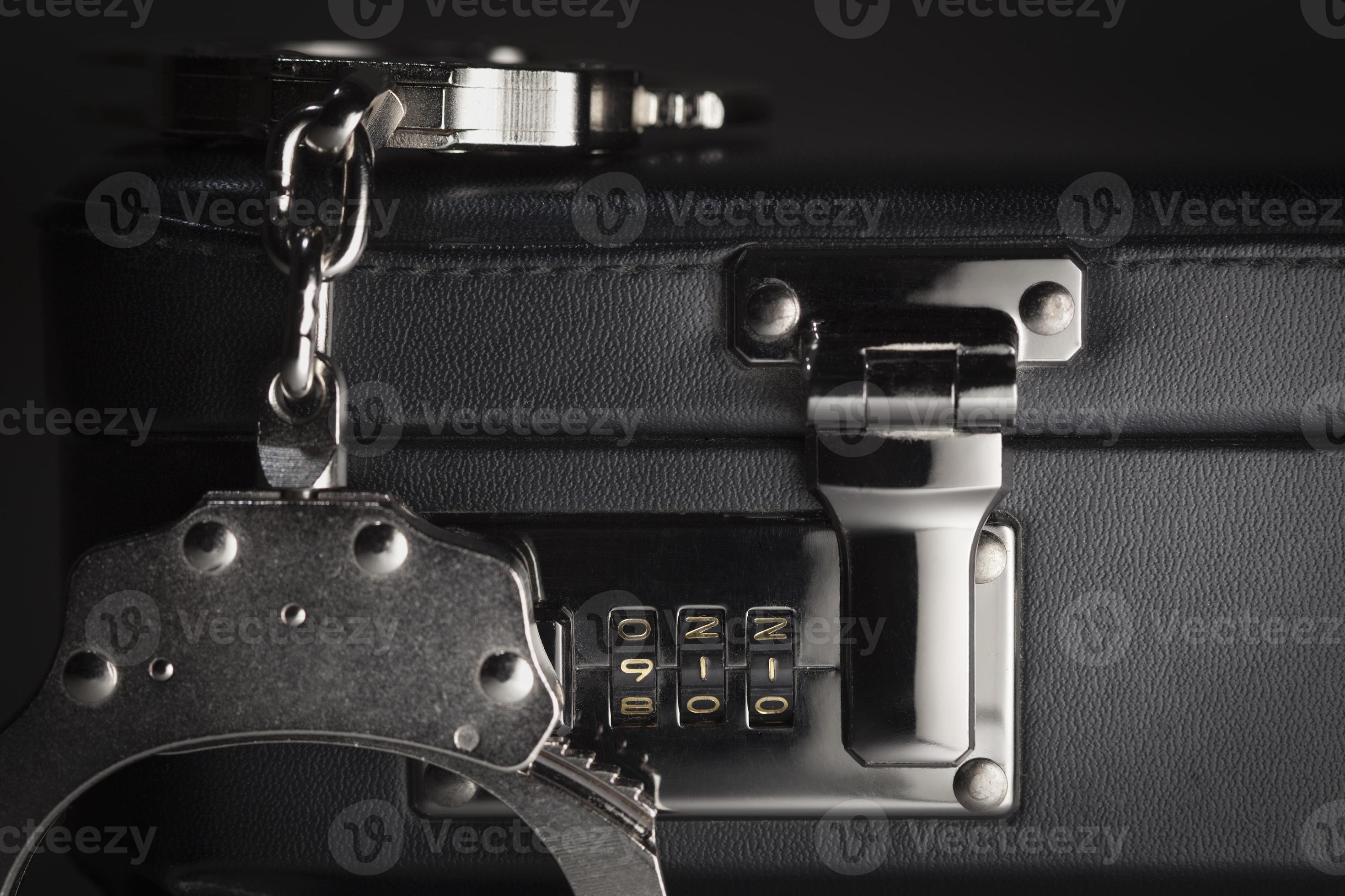 Pair of Handcuffs on Briefcase with 911 on Lock 16306083 Stock Photo at