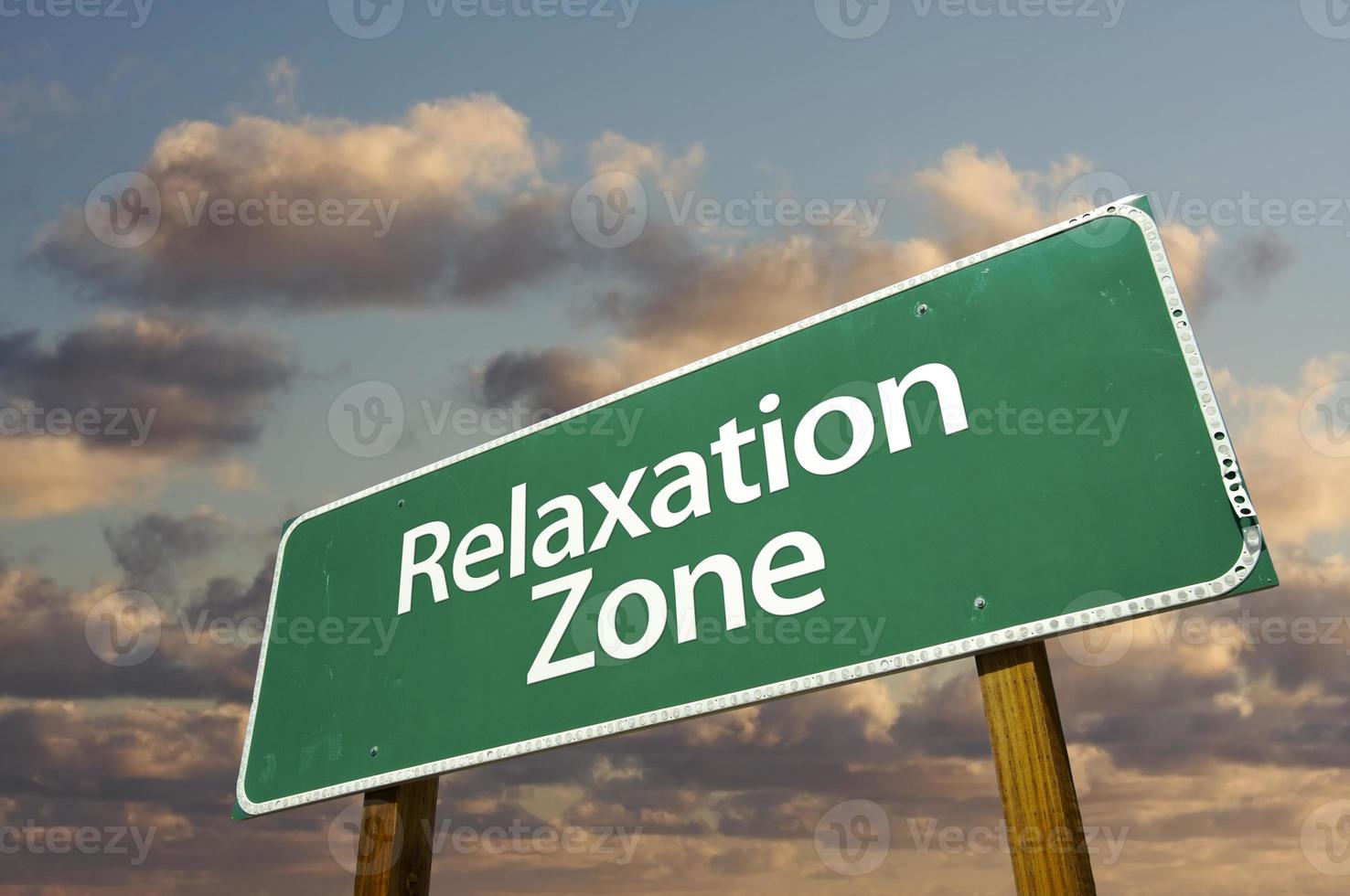 Relaxation Zone Green Road Sign and Clouds photo