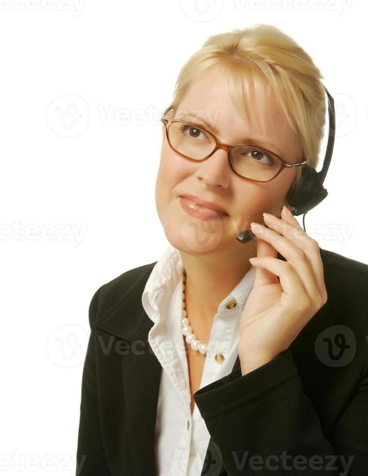 A beautiful friendly secretary telephone operator. photo