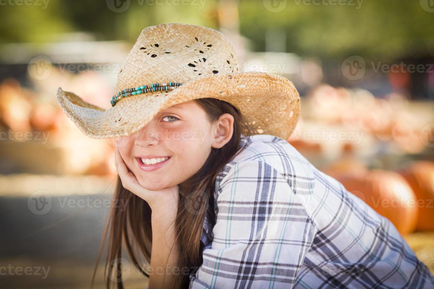 Pretty Preteen Girl Portrait at the Pumpkin Patch photo