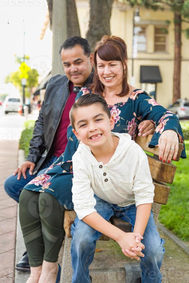 Mixed Race Young Family Portrait At The Park photo