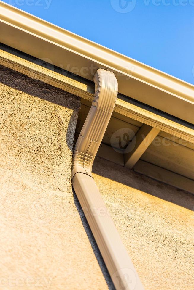 House with New Seamless Aluminum Rain Gutters photo