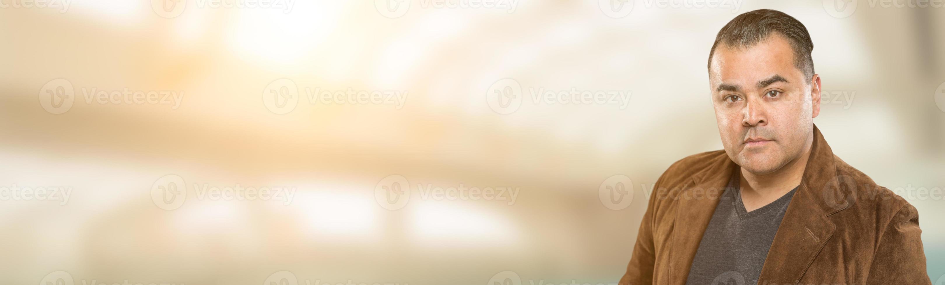 Handsome Adult Hispanic Male Portrait Wide Banner with Room For Text. photo