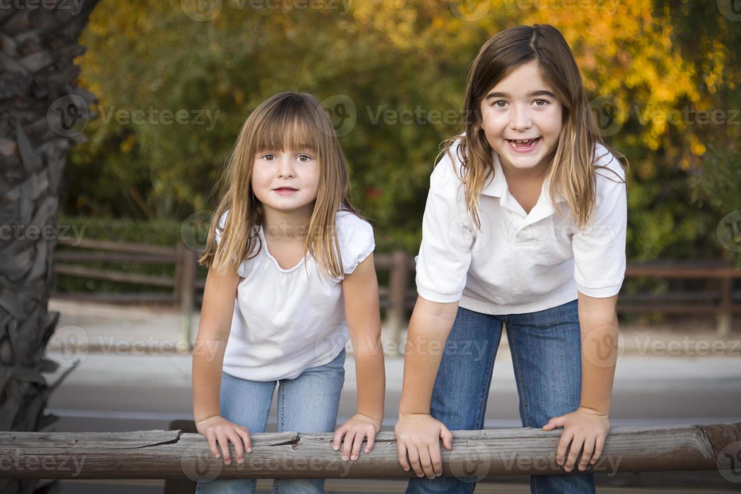 Pretty Young Sisters Portrait Outside photo