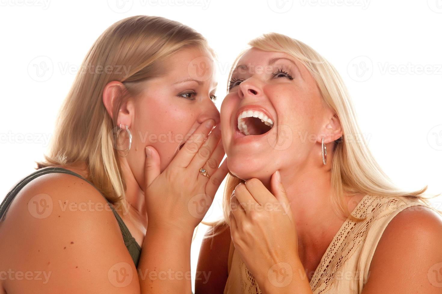 Two Blonde Woman Whispering Secrets photo