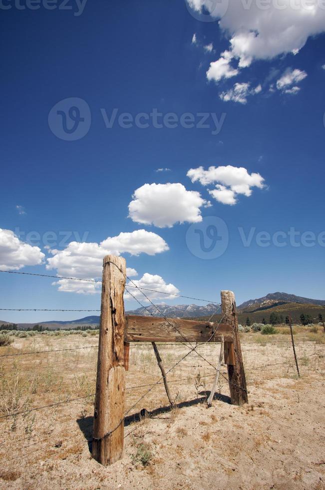 Aged Fence and Clouds photo
