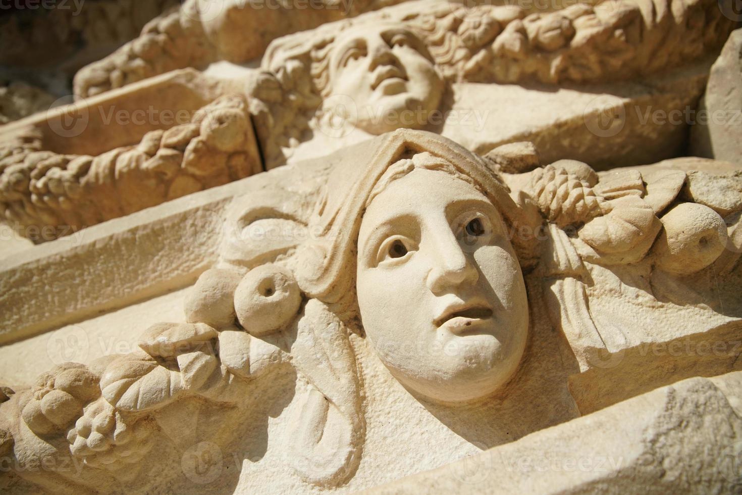 Ancient Mask Relief in Aphrodisias Ancient City in Aydin, Turkiye photo