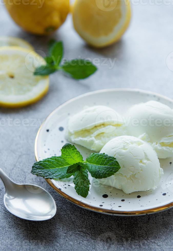 Homemade citrus lemon ice cream with mint photo