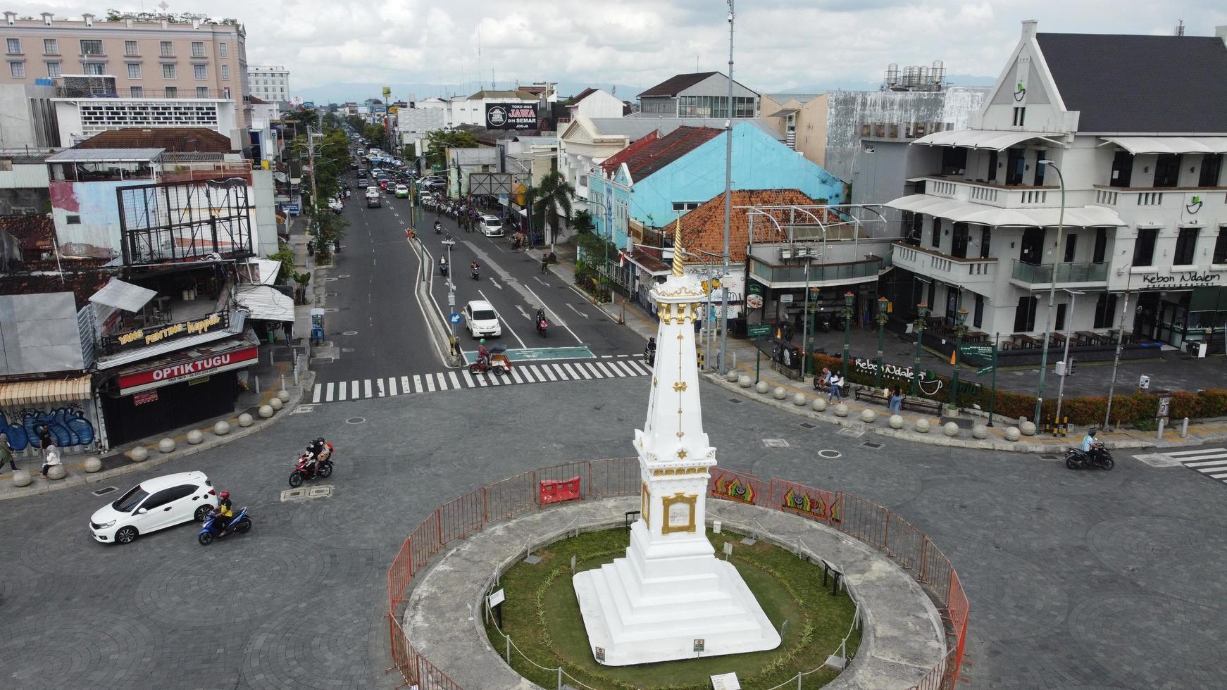 Aerial view of Tugu Yogyakarta with street background during the day photo