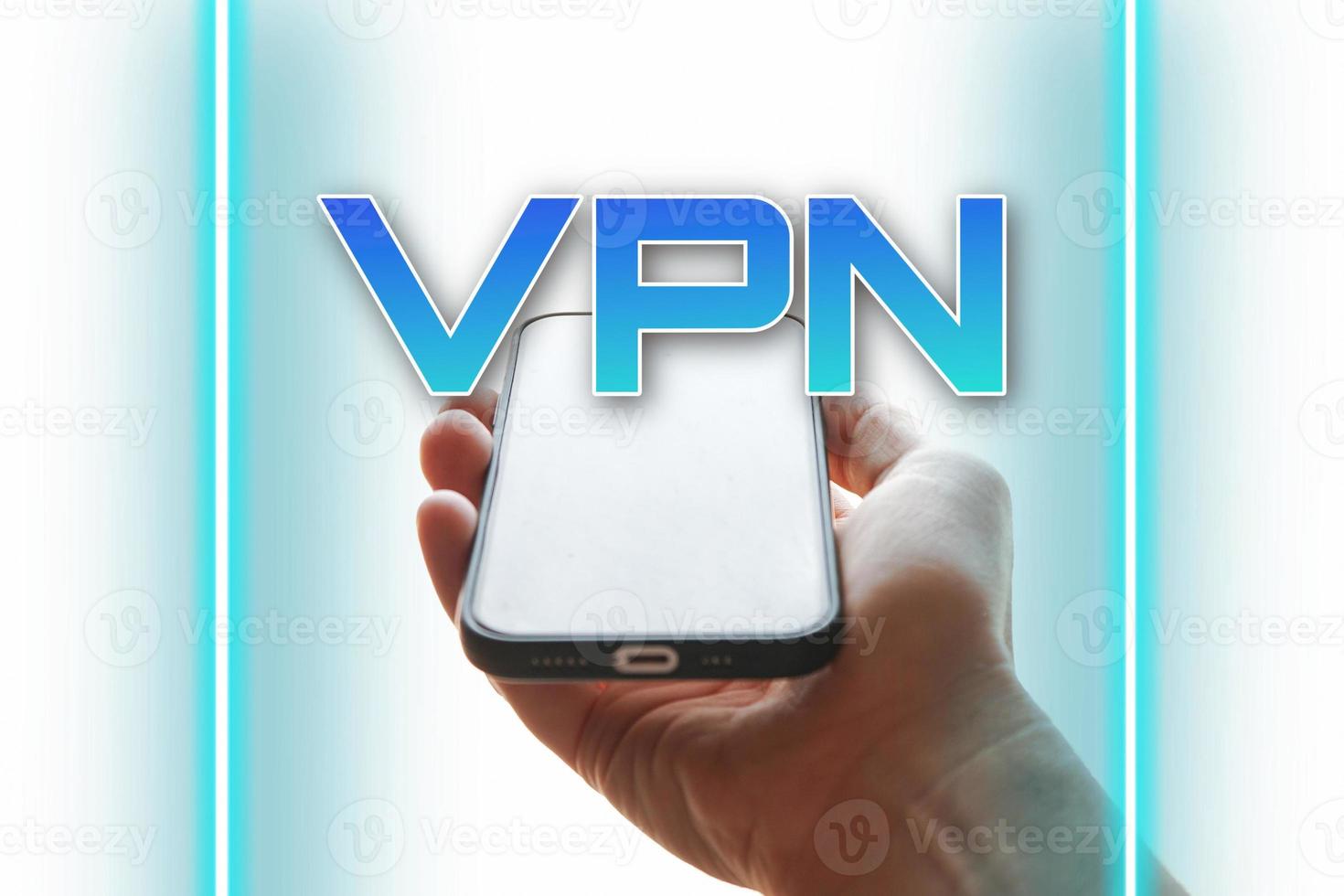 mano sosteniendo un teléfono inteligente con icono vpn foto