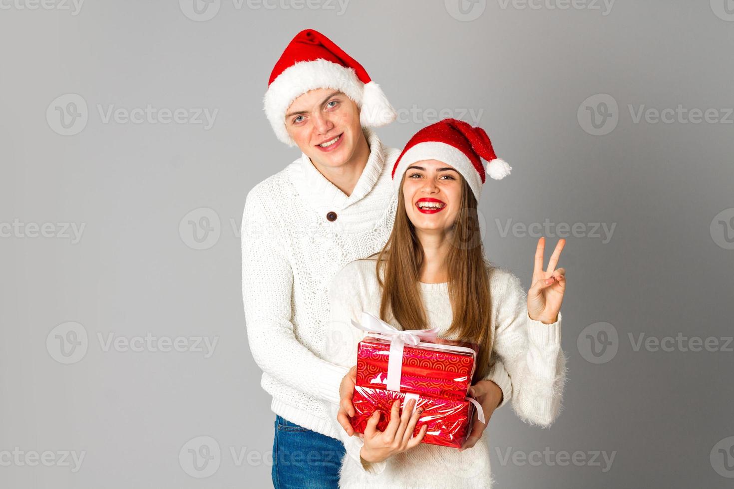 couple celebrate christmas with gifts photo