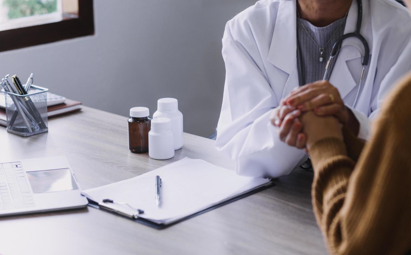 Homecare nursing service and elderly people cardiology healthcare. Close up of young hispanic female doctor nurse check mature caucasian man patient heartbeat using stethoscope during visit photo