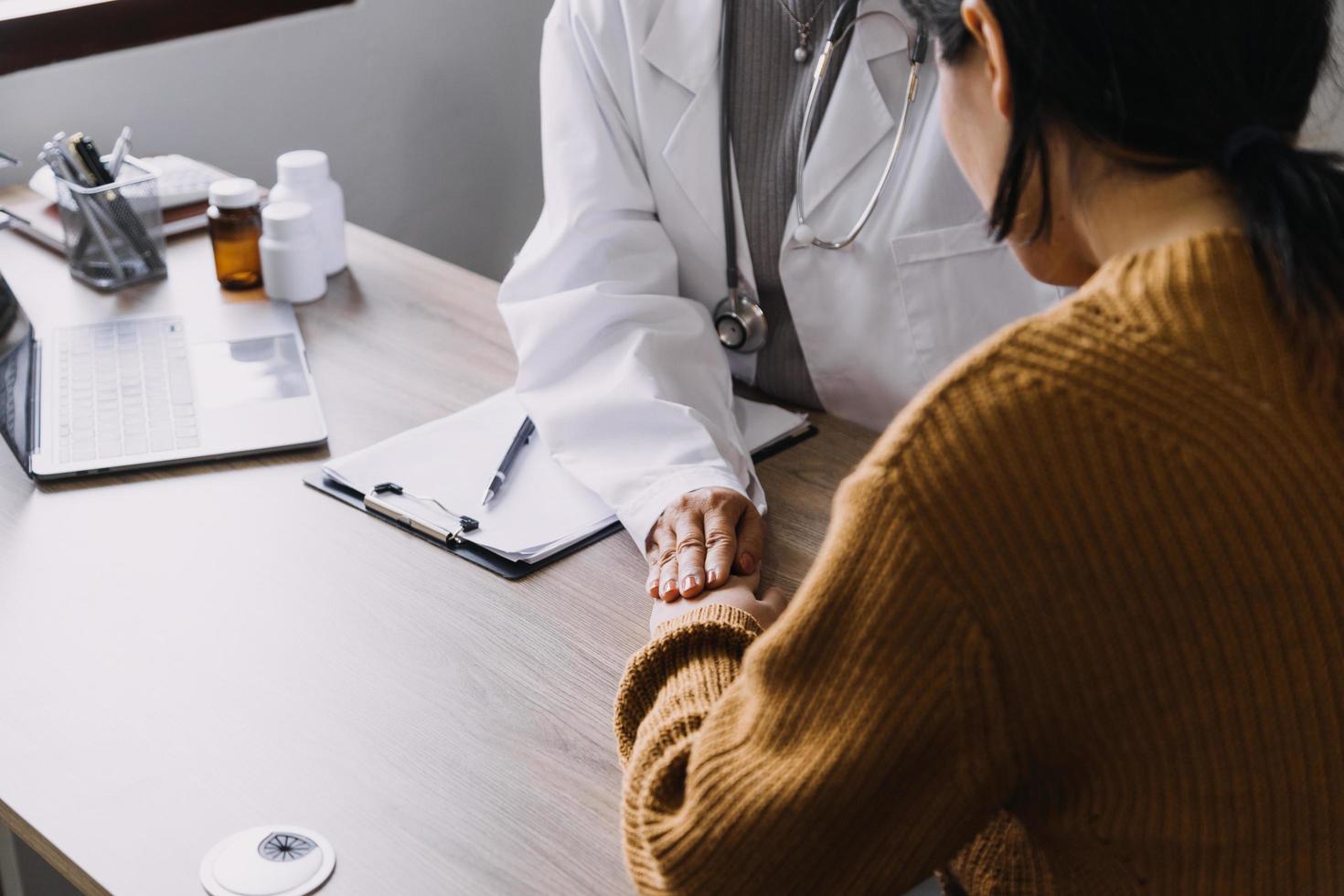 Homecare nursing service and elderly people cardiology healthcare. Close up of young hispanic female doctor nurse check mature caucasian man patient heartbeat using stethoscope during visit photo