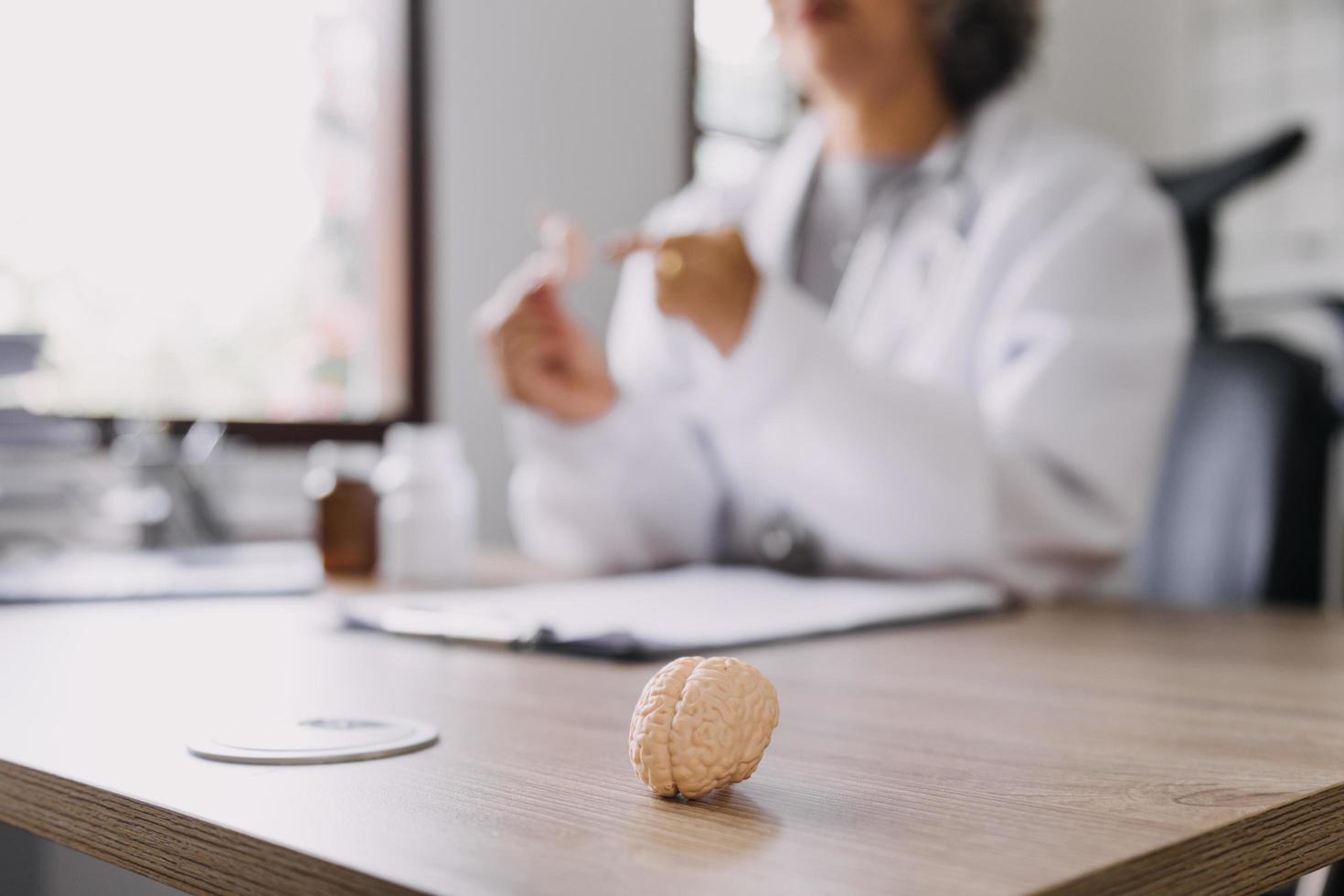 Homecare nursing service and elderly people cardiology healthcare. Close up of young hispanic female doctor nurse check mature caucasian man patient heartbeat using stethoscope during visit photo