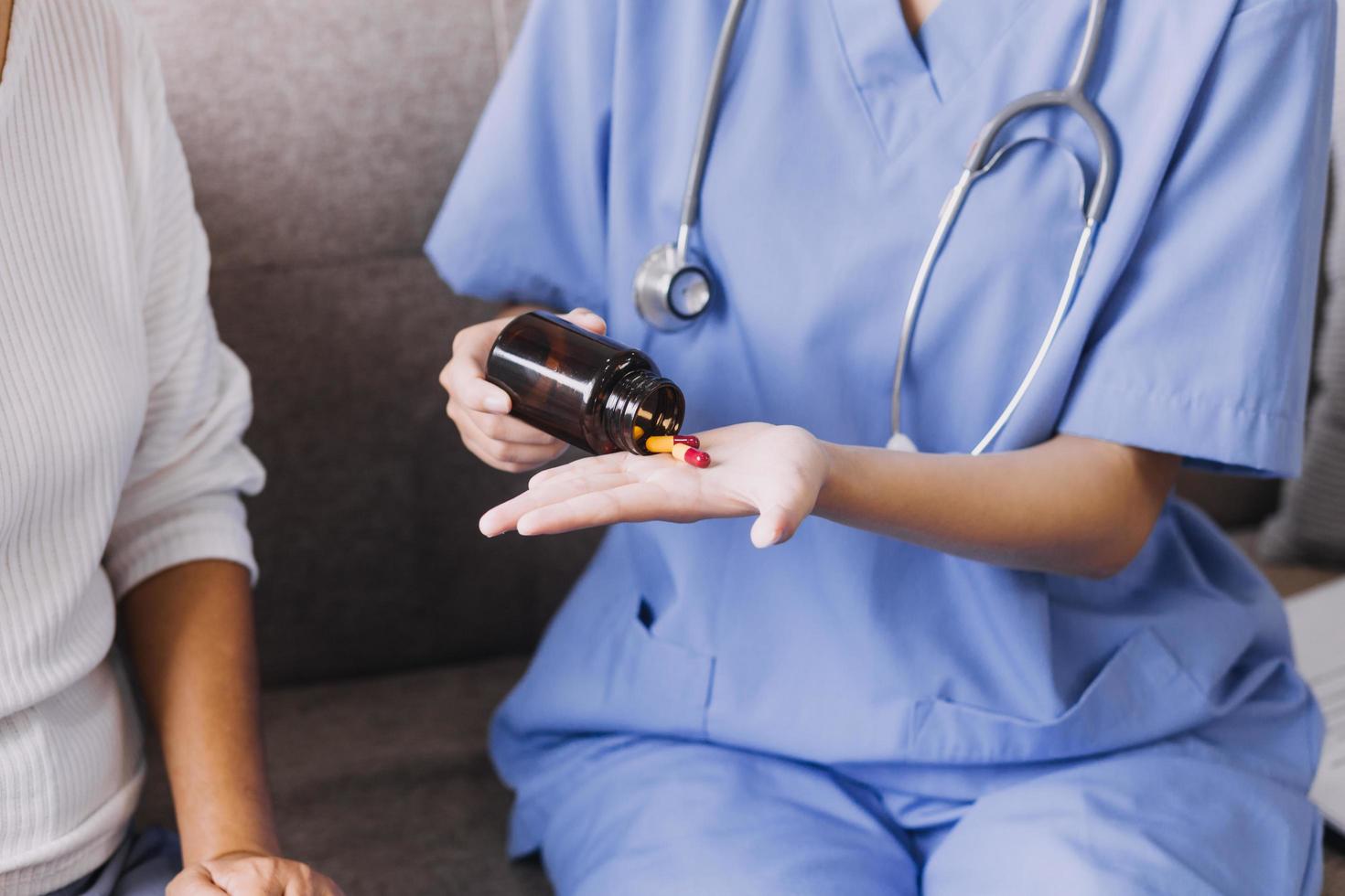 Homecare nursing service and elderly people cardiology healthcare. Close up of young hispanic female doctor nurse check mature caucasian man patient heartbeat using stethoscope during visit photo