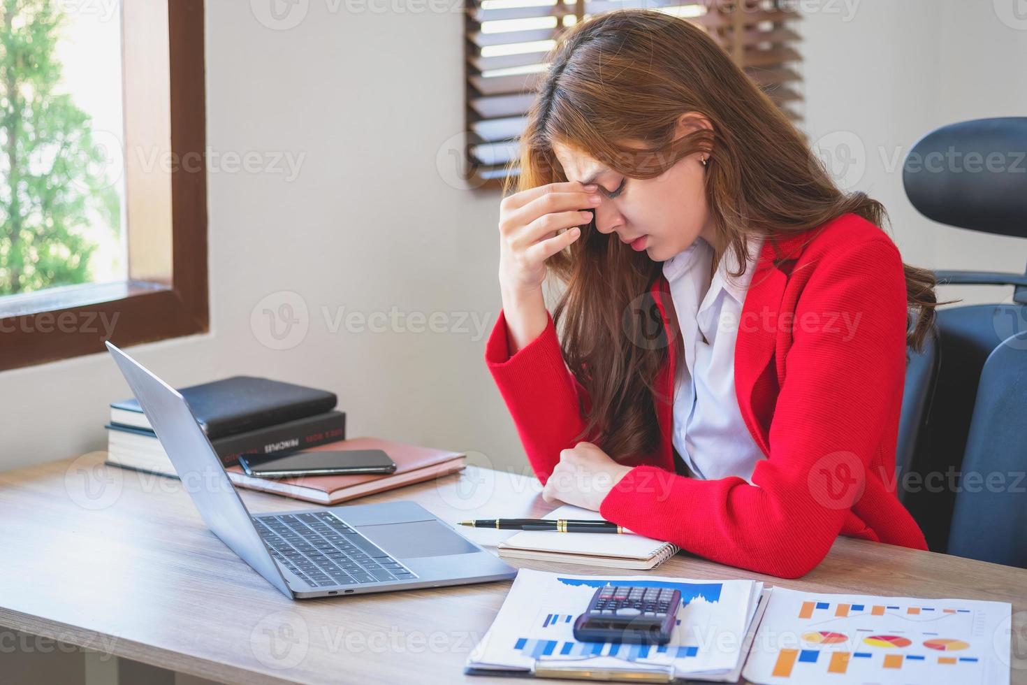 Concept Burnout Syndrome. Business Woman feels uncomfortable working. Which is caused by stress, accumulated from unsuccessful work And less resting body. Consult a specialist psychiatrist. photo