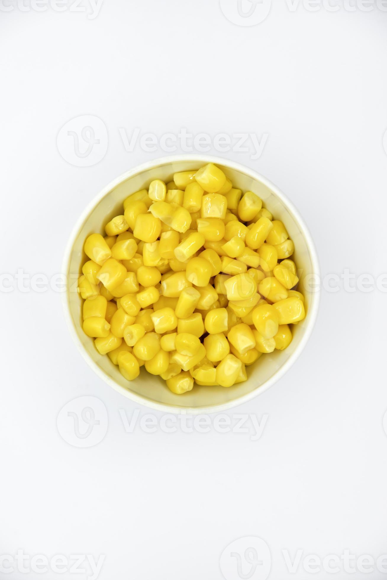Ripe corn on a white plate. Juicy yellow corn. Canned corn salad. 16342635 Stock Photo at Vecteezy