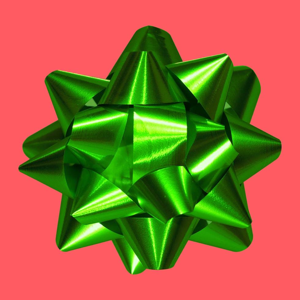 Green Christmas Bow with Red Background photo