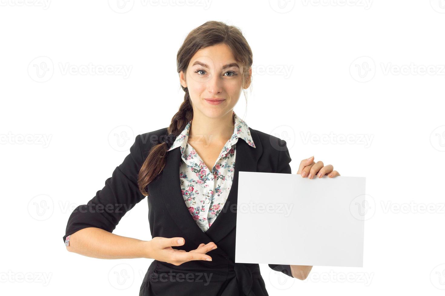 woman in uniform with white placard in hands photo