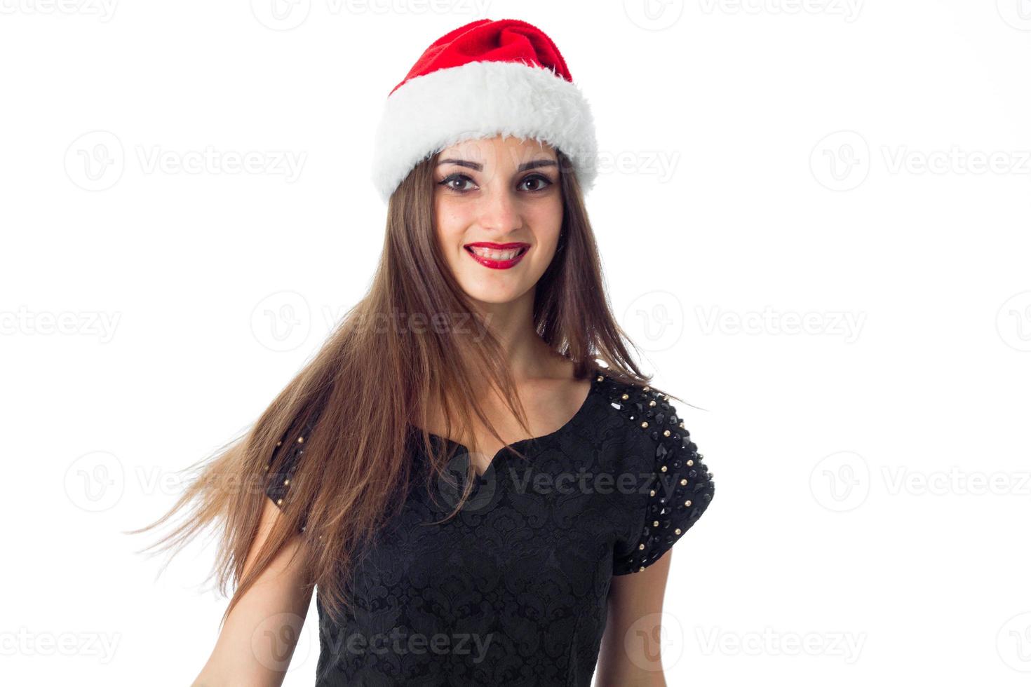 cheerful girl in santa hat photo