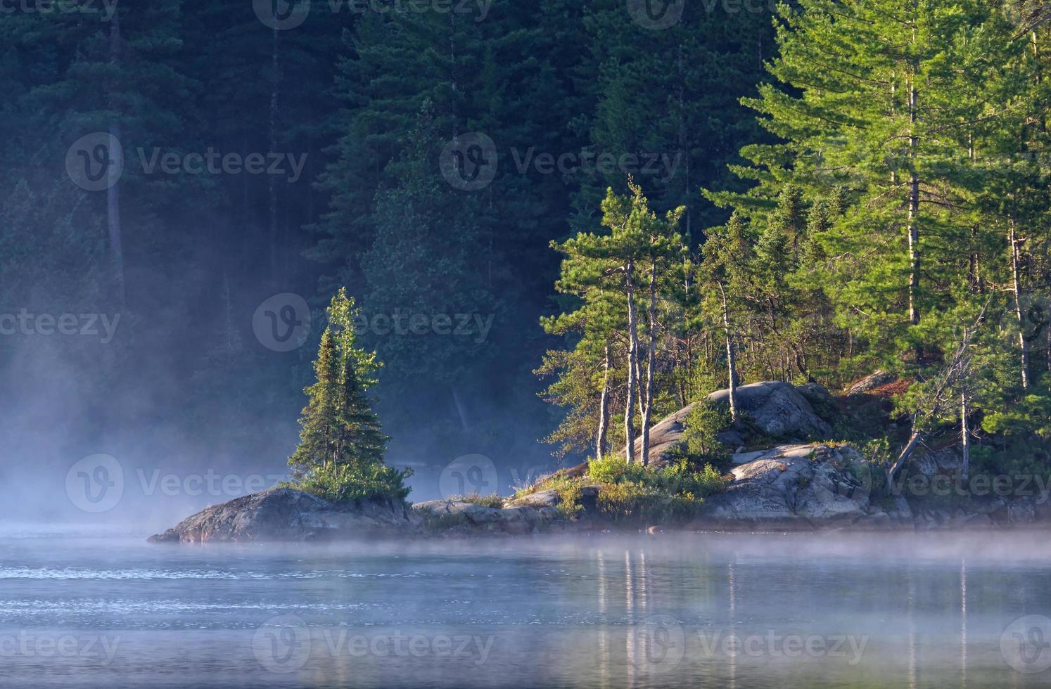 Misty Dawn on Wolf Lake, Temagami, Ontario, Canada photo