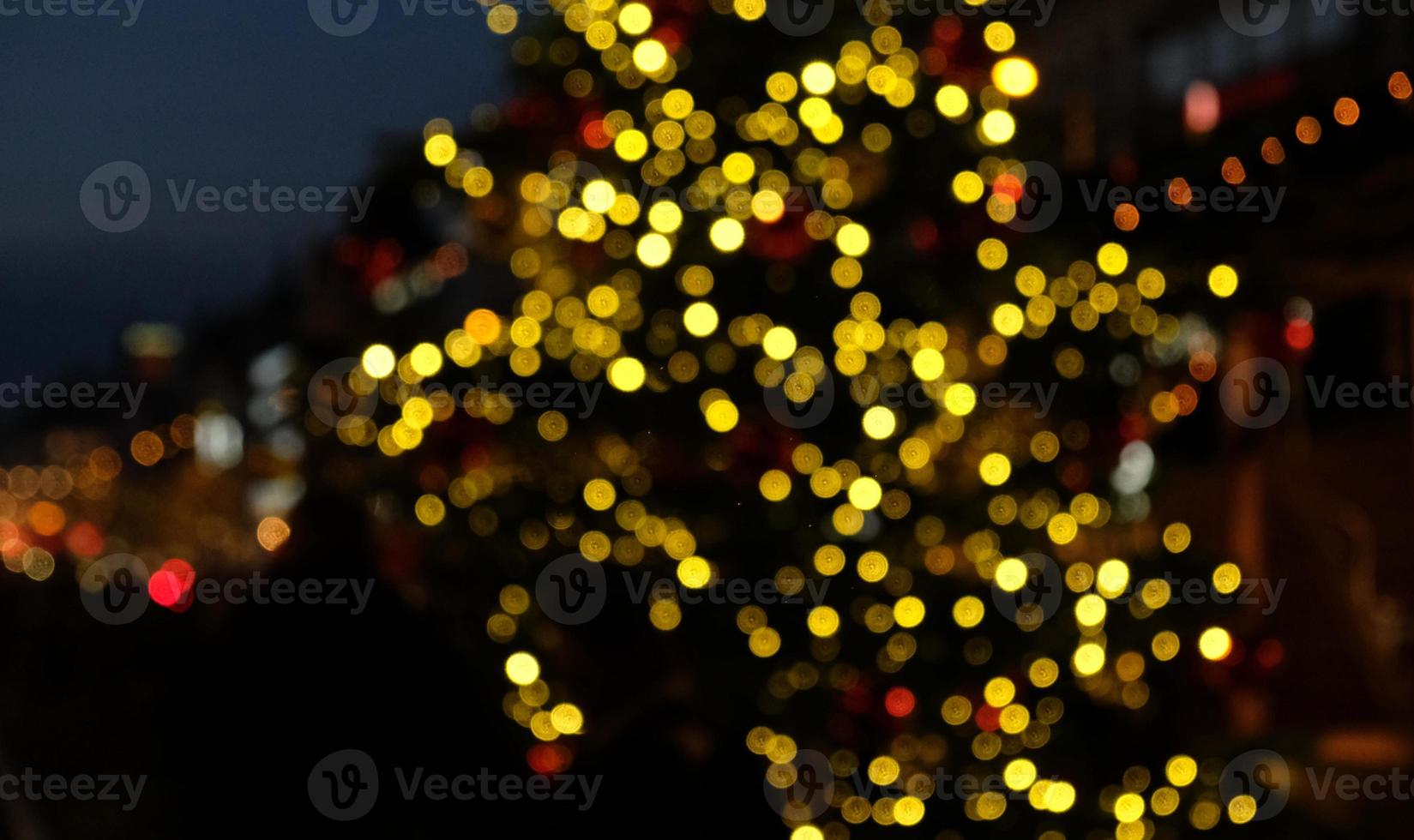 Abstract colorful background with bokeh. Blurred golden festive lights. Festive time concept. Party concept. Copy space. Round shape bokeh. Illuminating Yellow. photo