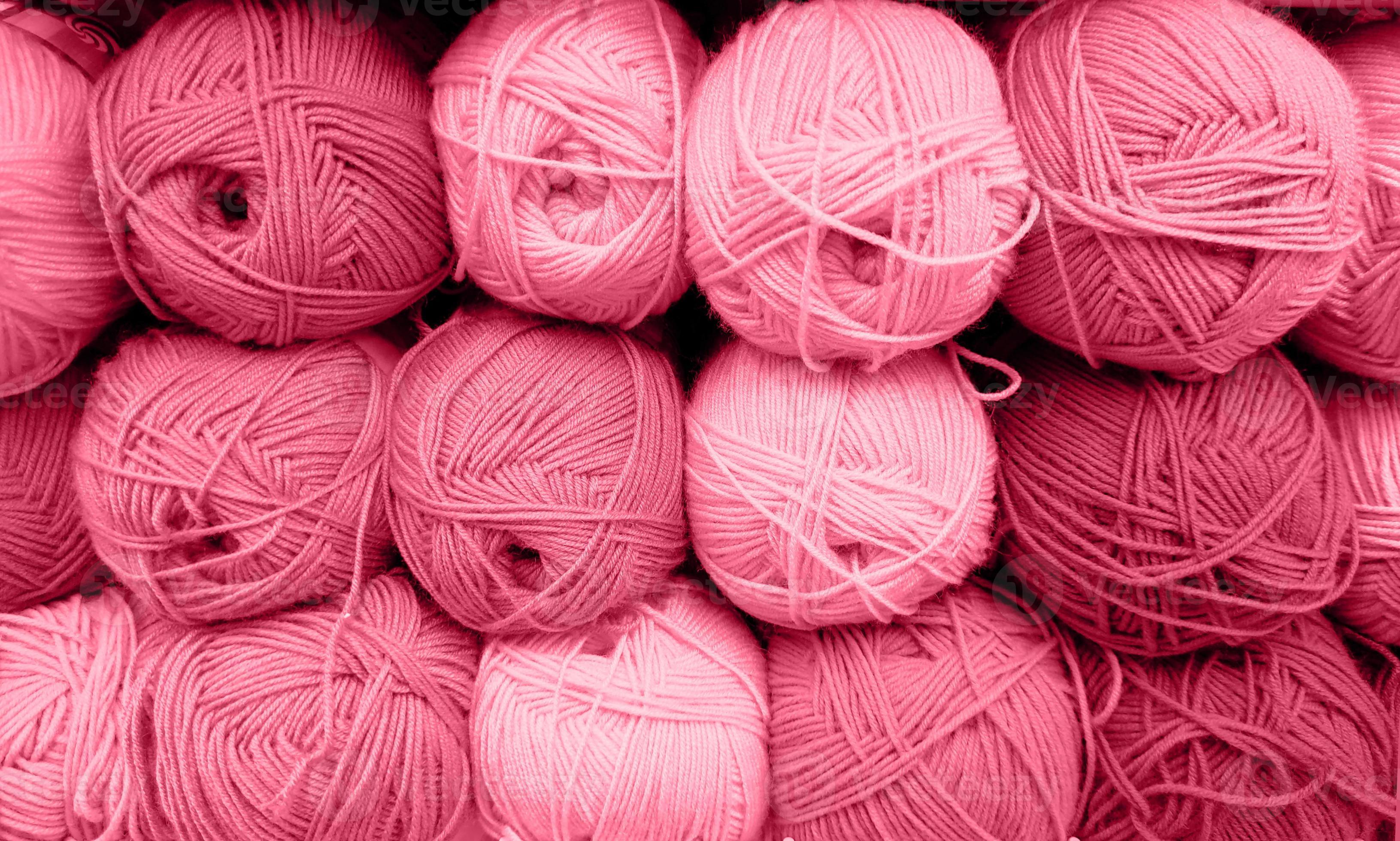 Colorful yarn balls on a podium on Craiyon