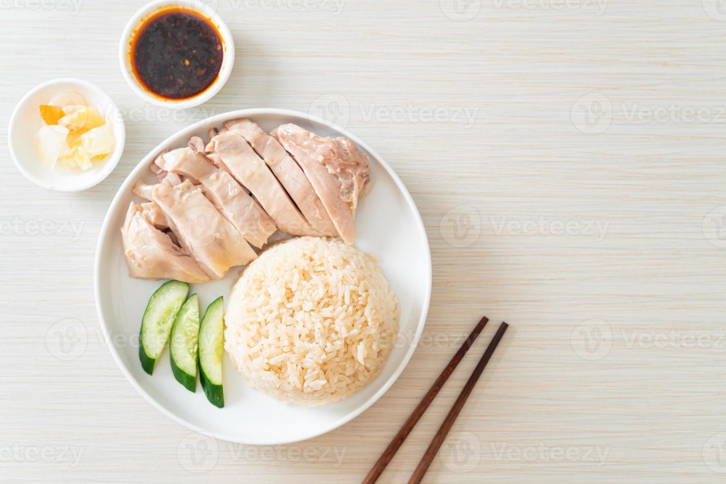 Hainanese chicken rice or rice steamed with chicken soup photo