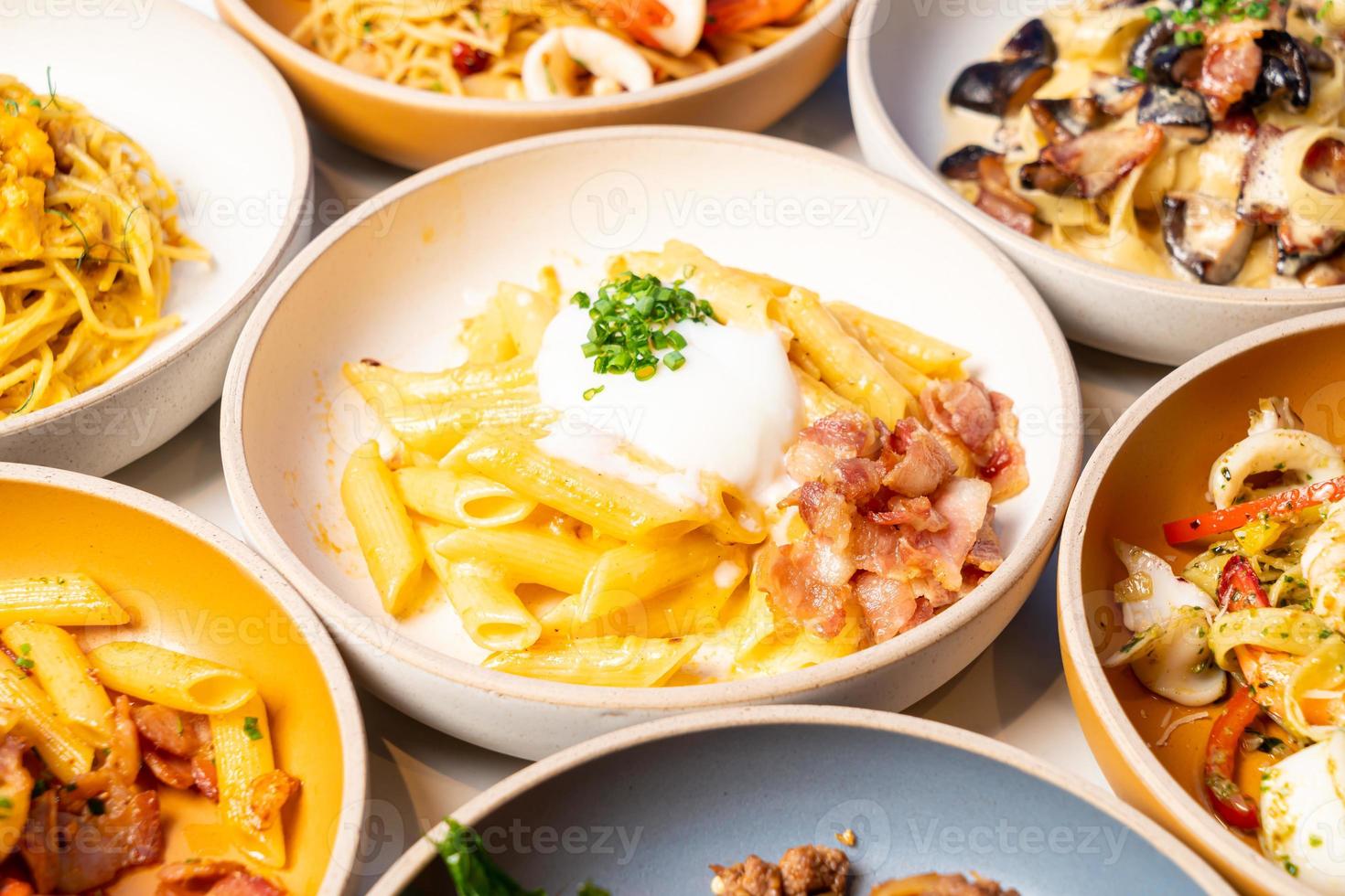 penne pasta carbonara bacon with egg photo