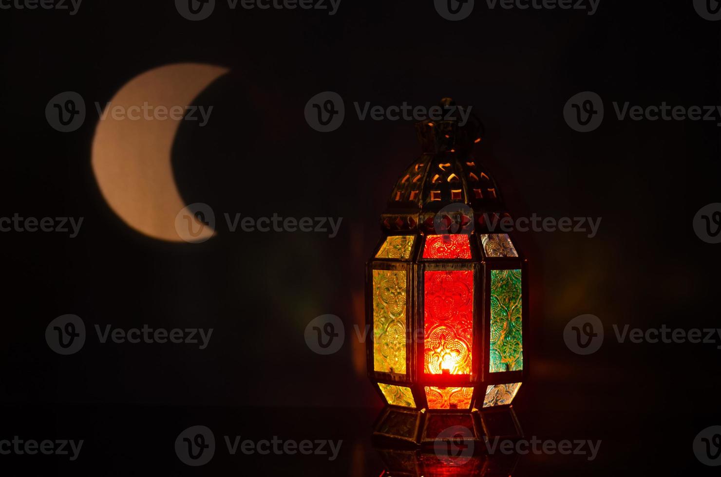 Lantern with moon shape from light on background for the Muslim feast of the holy month of Ramadan Kareem. photo