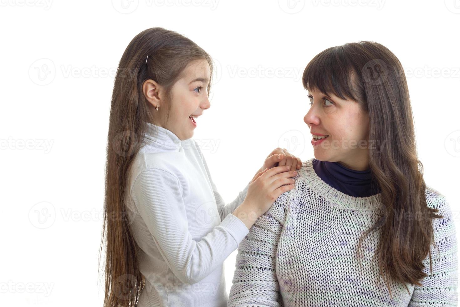 funny mother with her little daughter laughing photo