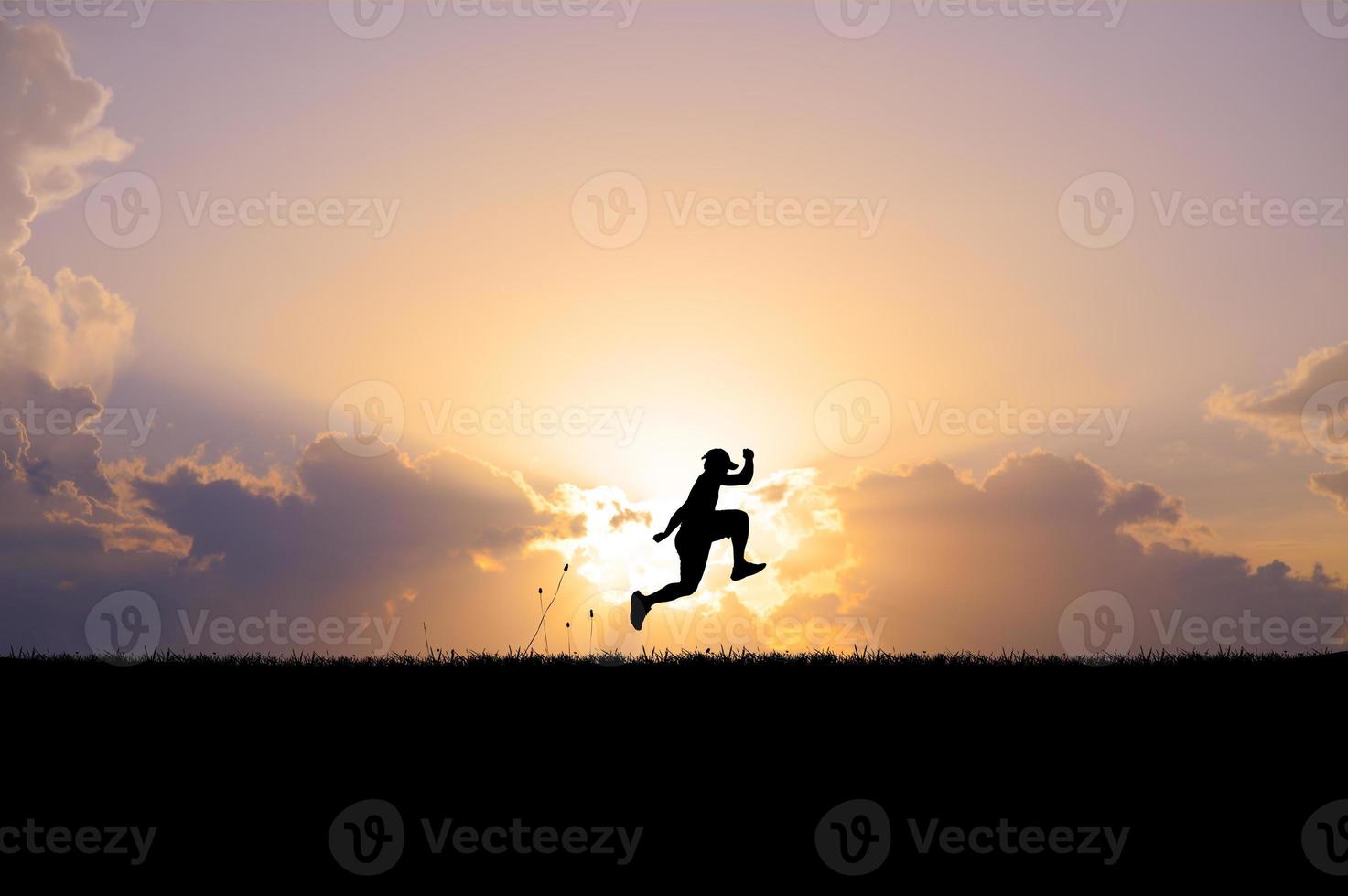 happy man running jumping in the meadow photo