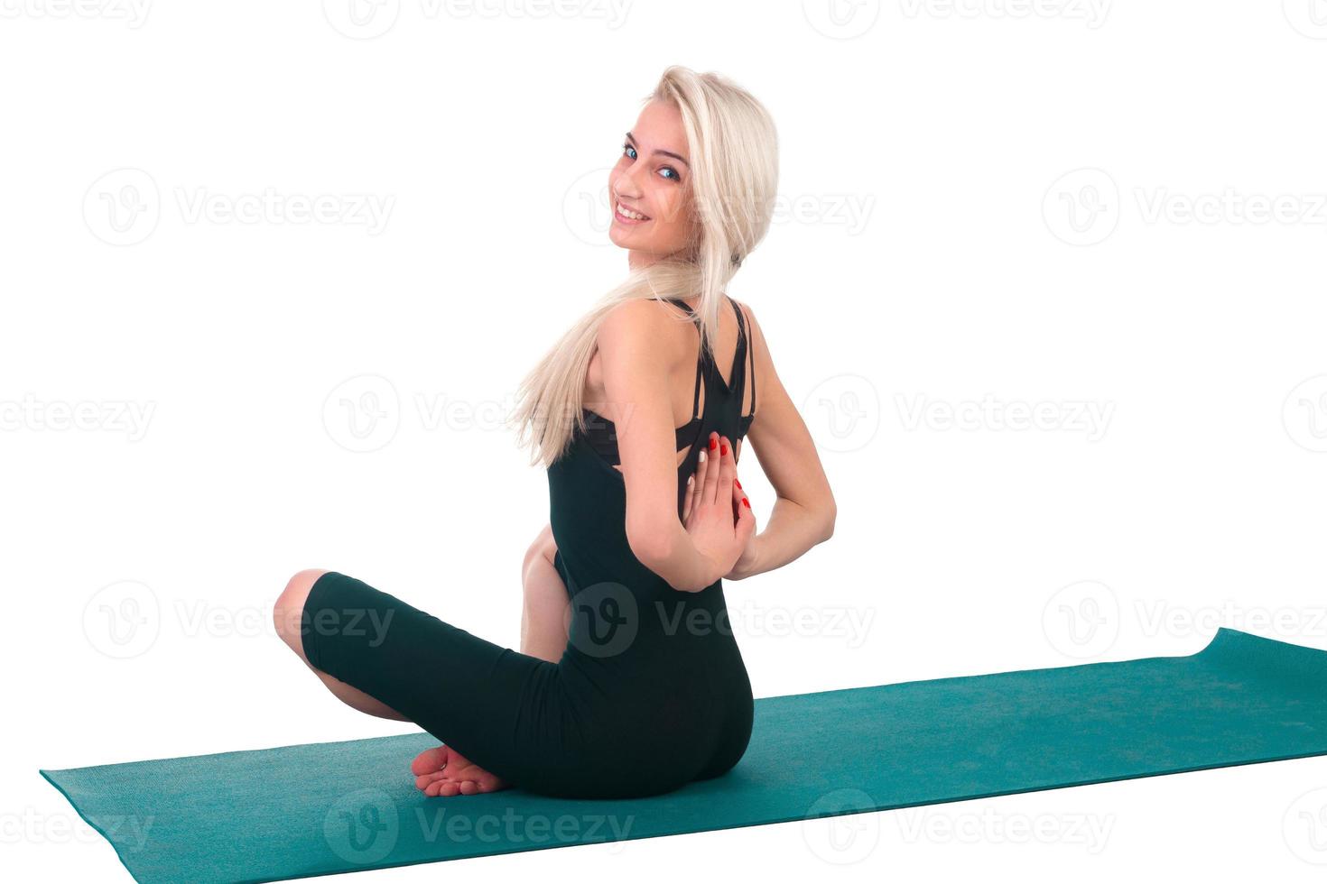 Woman practicing yoga photo