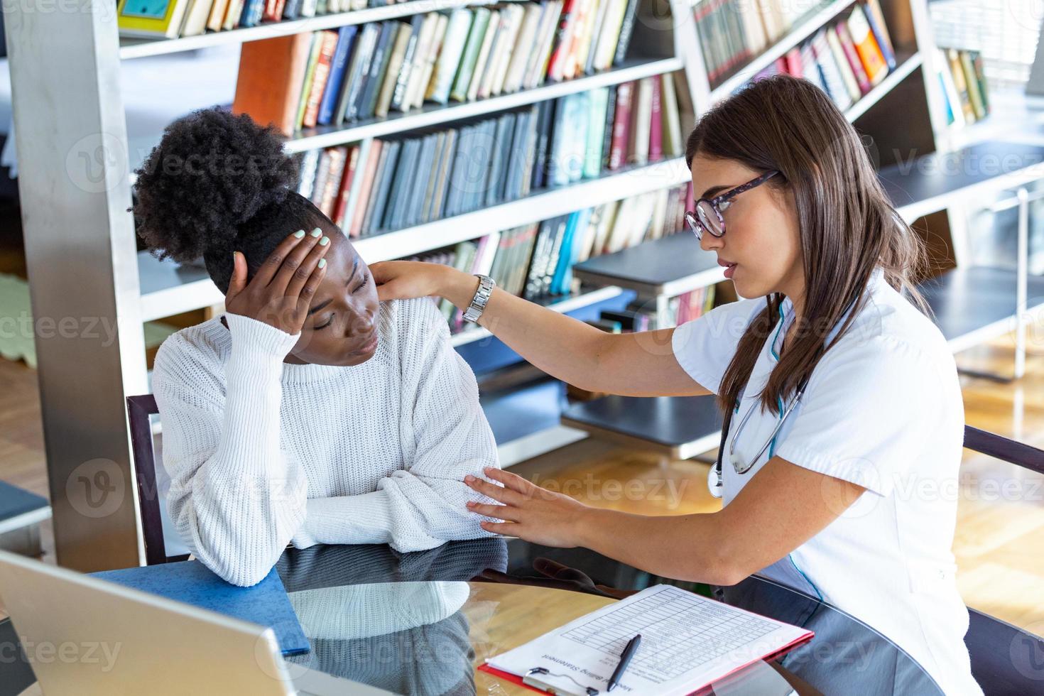 Patient receiving bad news, She is desperate and crying, Doctor support and comforting her patient with sympathy. Don't worry, this medical test is not so bad photo