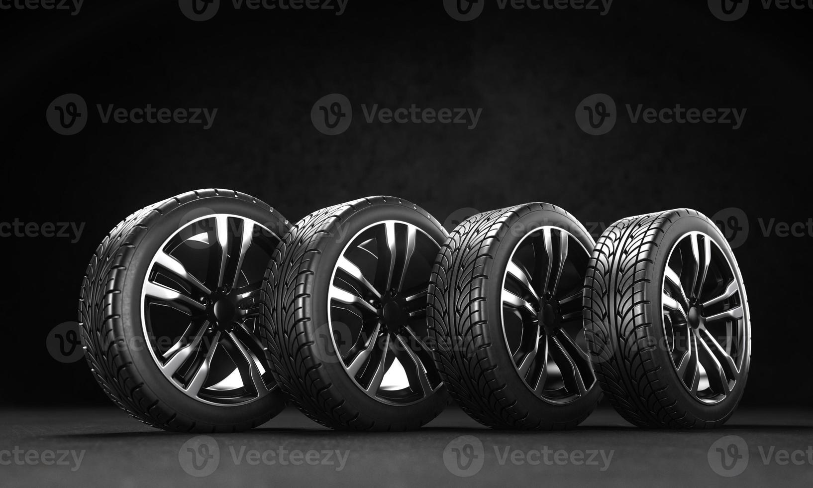 Four car wheels on the asphalt on a black background. 3D rendering illustration. photo